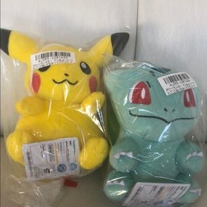 Pokémon pair Pikachu and balbursaur plushy